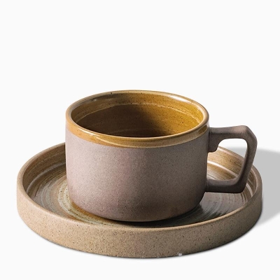 Tazza da caffè in gres con motivo caffè, tazza da tè e piattino